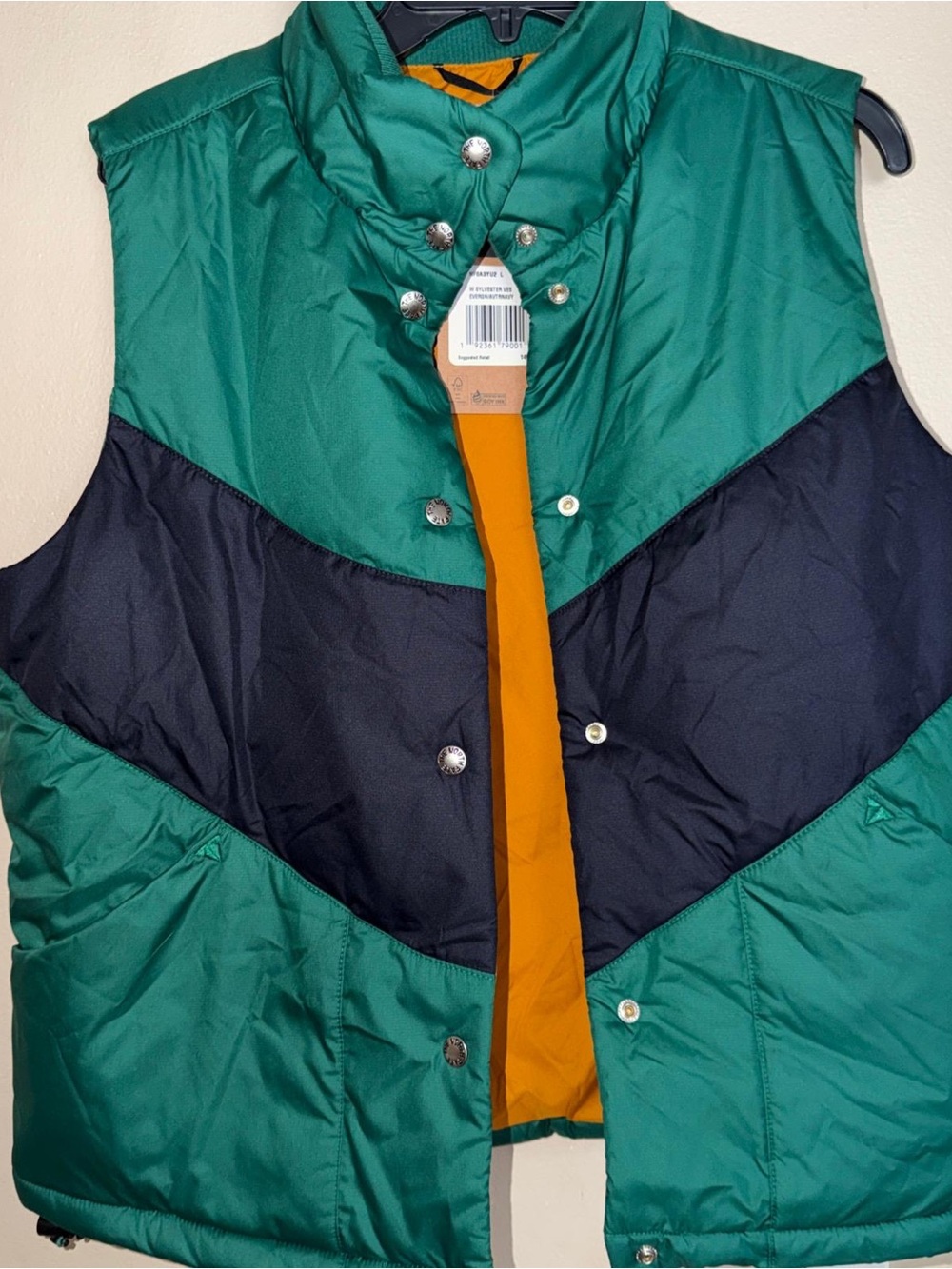 The North Face Green & Black Chevron Puffer Vest with Orange Lining